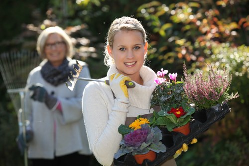 Insured and safety-focused gardeners completing outdoor work